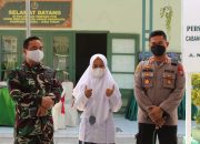 AKBP Abdul Hafidz Hadiri Bansos Dan Vaksinasi Akabri 89 Di Kab. Sampang