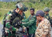 Satgas Yonif 509 Kostrad Laksanakan Patroli Keamanan dan Komsos di Pasar Sugapa